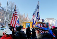 Democrats Abroad Munich to hold a “Bridges not Walls” rally to welcome the US delegation to Munich Security Conference 2017 Marchers pass by Marienhof on their way to Marienplatz -- munichFOTO